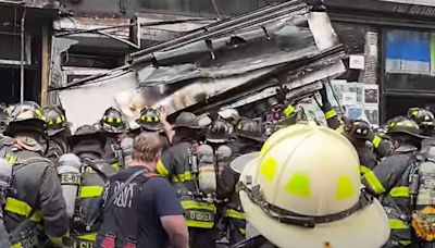 Shocking video shows metal shop awnings crash down on NYC firefighters, wounding 3