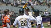 Rooker, Schuemann hit 3-run homers in Athletics' 19-8 rout of Orioles