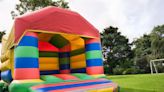 Two-year-old boy dies after getting swept away in bounce house by wind