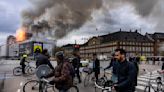 Fire destroys Copenhagen's Old Stock Exchange dating to 1600s, collapsing its dragon-tail spire