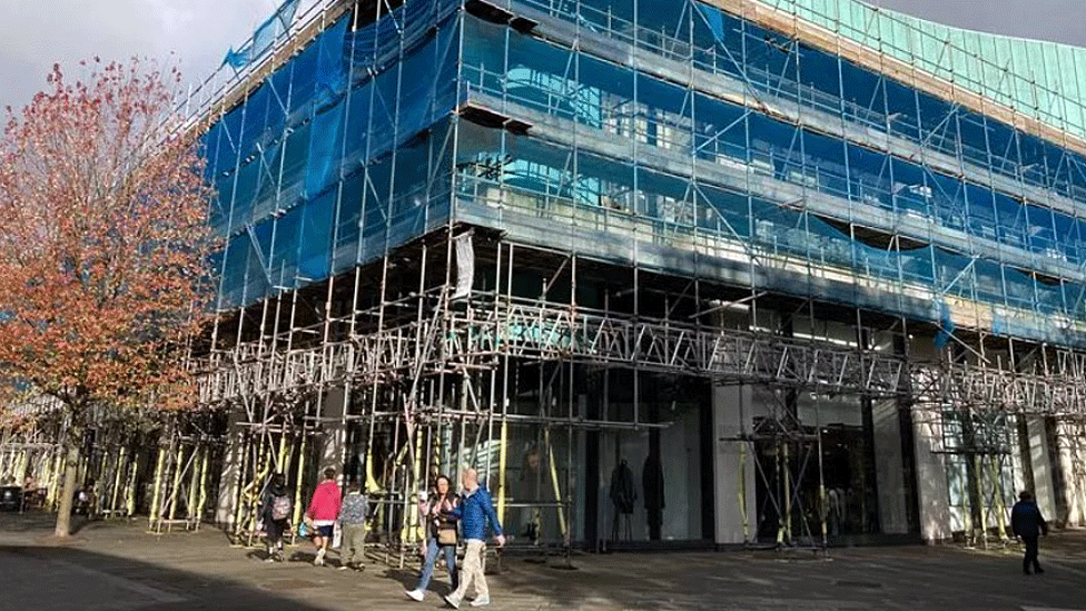 Shop scaffolding finally down almost six years on