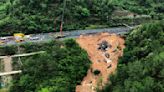 Death toll jumps to at least 48 as the search continues in southern China highway collapse