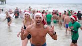 In Pictures: Polar plunges as plucky swimmers mark Christmas with a splash