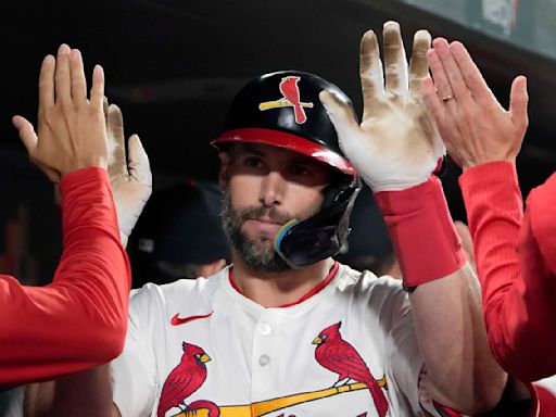 Goldschmidt homers twice to help Cardinals beat Cubs 4-3 after lengthy rain delay