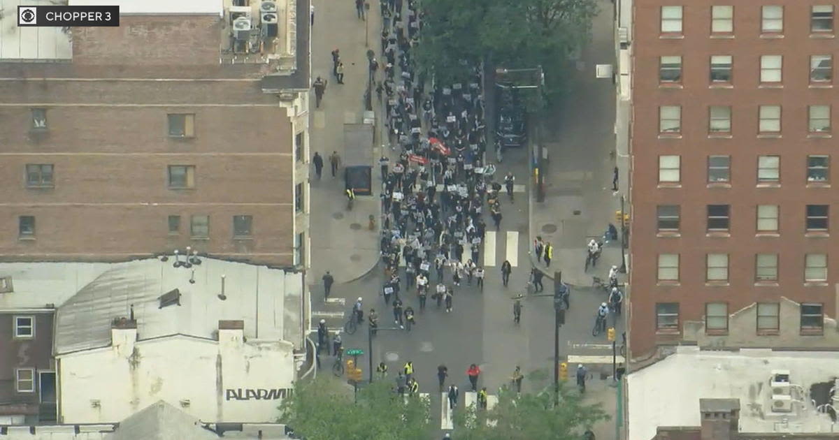 Protesters march to call on banks to divest on Israel's Independence Day in Philadelphia's Center City