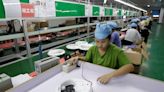 China's factory activity unexpectedly dips as property pain persists