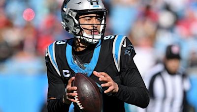 CHARLOTTE, NORTH CAROLINA- JANUARY 07: Bryce Young #9 of the Carolina Panthers looks to pass during the second quarter against the Tampa Bay Buccaneers...