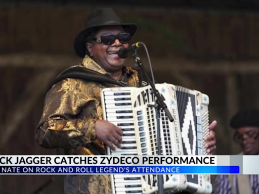 Mick Jagger watches Zydeco legend Nathan “Big Nate” Williams Sr. perform at Jazz Fest