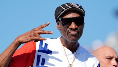 Snoop Dogg is a proud ‘grandpa’ in adorable photo with granddaughter at Olympics