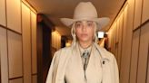 Beyoncé Dresses Up Her Sculpted All-Beige Suit With a Turquoise Bolo Tie and an Espresso Clutch