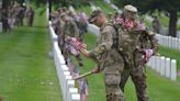 ‘Preserve their legacy’: Old Guard places flags on graves of fallen service members at Arlington for Memorial Day