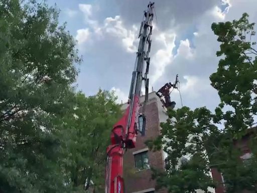 Crane boom collapses onto roof in Brooklyn construction accident