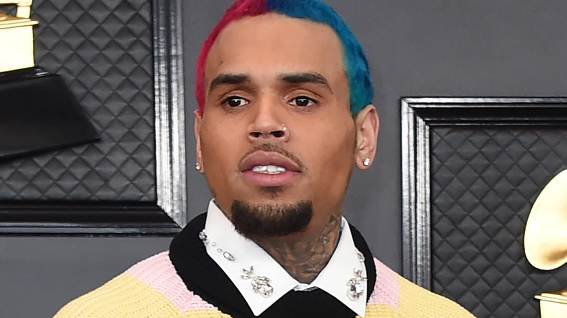 Chris Brown sued by men who claim to have been beaten after being invited backstage at Texas concert