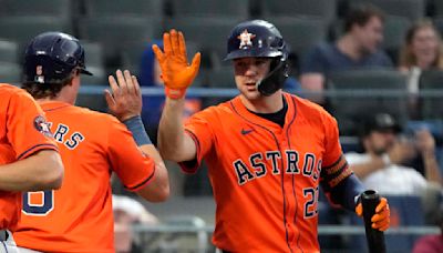 Astros move above .500 for 1st time this year, beat Mets 10-5 in 11 innings for 9th win in 10 games