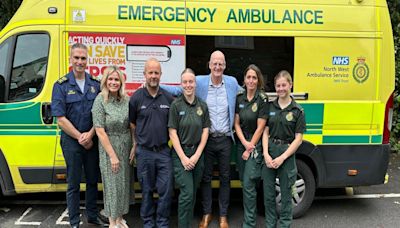 Former footballer visits ambulance staff who saved his life after cardiac arrest