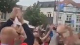 Scenes of chaos as Serbian fans begin 'Putin' chants after England loss