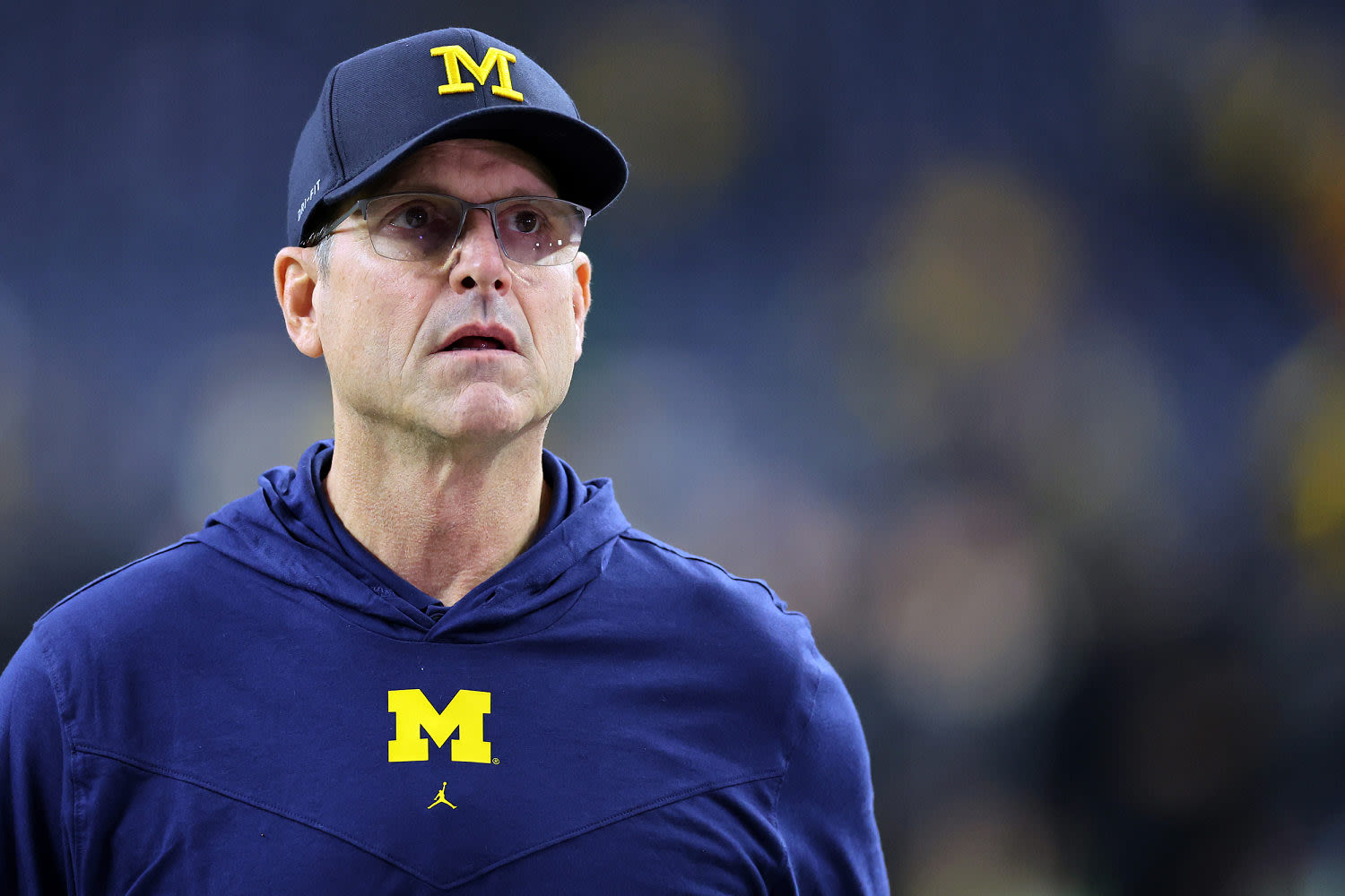 NCAA punishes Jim Harbaugh for Michigan recruiting violations with 4-year sanction