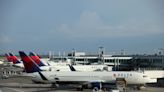 U.S. allows Delta to temporarily cut some New York, Washington flights