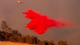 Firefighters gain ground against Southern California wildfire but face dry, windy weather