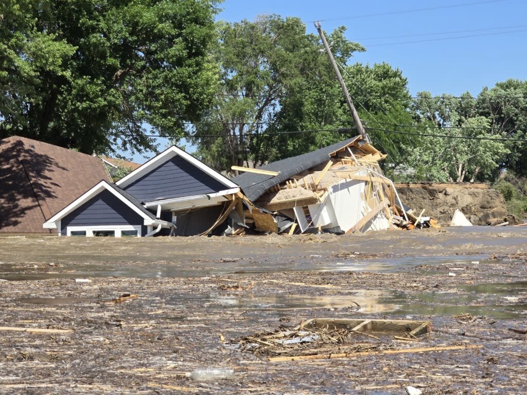 Homes and roads in McCook Lake area ravaged by flooding