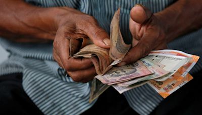 Rupee nudges up on lower US bond yields, forward premiums rise