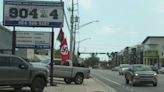 Jacksonville off-road truck and repair shop flying Nazi Swastika flag outside of business