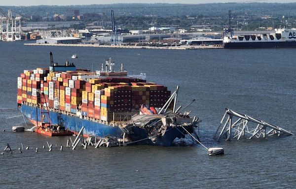 Container ship that caused Baltimore bridge collapse to be refloated, moved out of channel