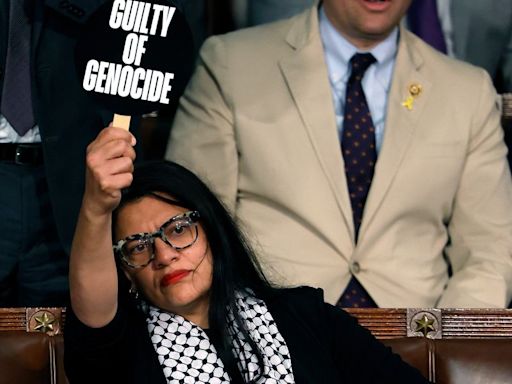 Rep. Rashida Tlaib Protests Netanyahu Speech With 'War Criminal' Sign