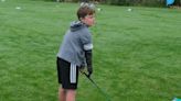 Boy with limb difference ‘excited’ to play golf with grandfather thanks to tool