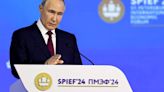 Putin says he sees no threat warranting use of nuclear arms but warns Russia could arm Western foes