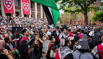 Students walk out of Harvard College graduation; UCLA contends with new protest