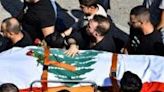 The funeral of Reuters journalist Issam Abdallah, killed in an attack by an Israeli tank in southern Lebanon that also wounded two AFP journalists