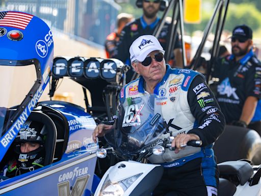 NHRA legend John Force walking with assistance after Traumatic Brain Injury from crash