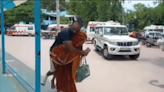 MP Woman Carries Injured Husband On Her Back In Absence Of Stretcher At Dist Hospital; Video Viral
