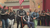 NYPD officers released from Queens hospital to applause after shooting
