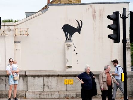 Banksy’s billboard cat removed as meaning of his London animals revealed