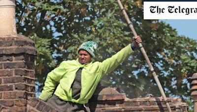 Riot police negotiate with man hurling masonry from roof