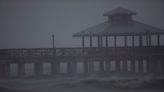 Haunting images: 'Day of' Hurricane Ian photos include Fort Myers Beach pier still standing