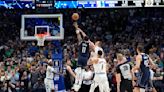 Kyrie Irving's running left-hander at the buzzer lifts Mavs over Nuggets 107-105