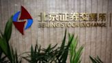 Listing hopefuls on Beijing bourse slash floor IPO prices