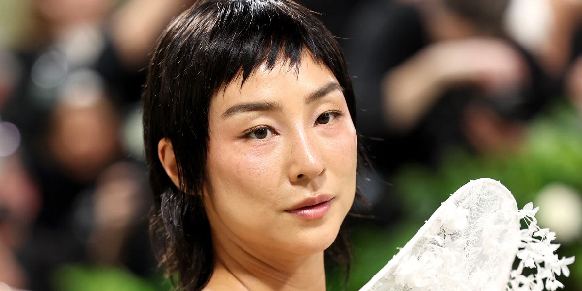 Watch Greta Lee Realize In Real Time That She Can't Talk Or Eat In Met Gala Gown