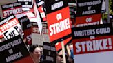 Writers' strike: Hollywood scribes picket studios for better pay. 'It's not sustainable'