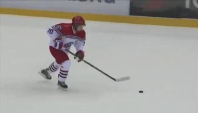 Putin dominates ice hockey clash