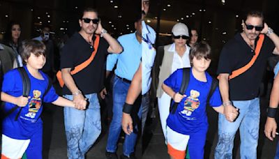 Shah Rukh Khan does his doting dad, loving husband duties right as he returns to Mumbai with his son AbRam and wife Gauri Khan: WATCH