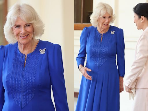 Queen Camilla Favors Sapphire Dress With Exaggerated Shoulders for Final Day of the Emperor and Empress of Japan’s State Visit