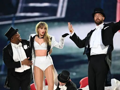 Taylor Swift’s boyfriend Travis Kelce performs with her on stage during London Eras concert; Tom Cruise dances in the crowd. Watch