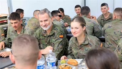 Action girl! Crown Princess Leonor of Spain looks elegant in uniform as her father King Felipe visits her during military training