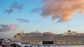 A giant cruise ship that holds thousands of passengers is sailing around the English Channel looking for a crew member who went overboard