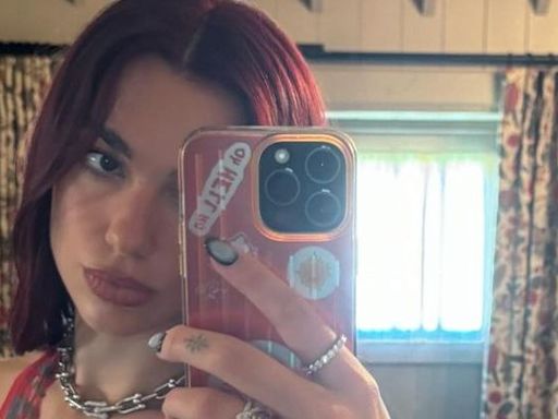 Dua Lipa Exudes Rock-Star Energy in a Metallic Halter Top and a Funky Belt