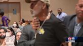 New Orleans activist, wife and other arrested during city council meeting